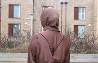 Brown open abaya with floral embellishments on the shoulders
