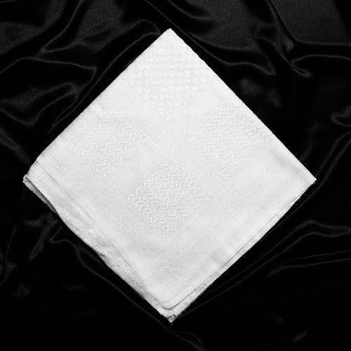 An imamaad white scarf folded